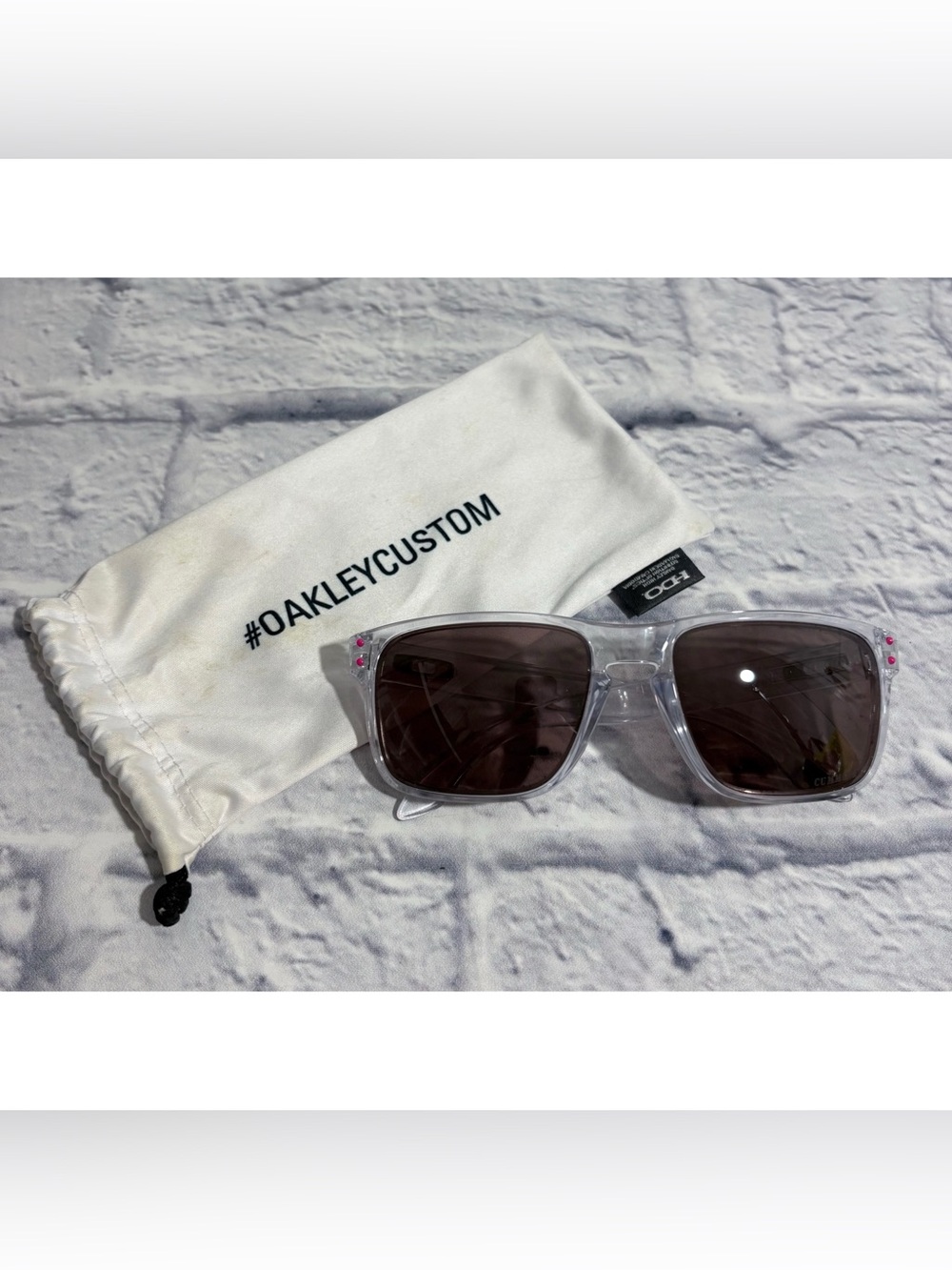 Oakley “Holbrook” customized clear frame/pink detail sunglasses + sleeve